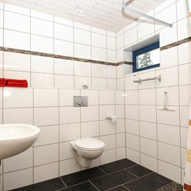 Wohnmobilstellplatz: Dusche und Toilette im Servicehaus - Galå Fjällgård