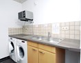 Wohnmobilstellplatz: Spülmöglichkeit, Mikrowelle, Waschmaschine und Wäschetrockner - Galå Fjällgård