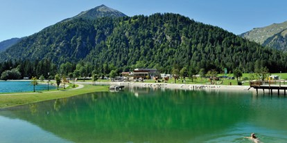Reisemobilstellplatz - Umgebungsschwerpunkt: Strand - Österreich - Stellplatz vor und im Alpen Caravan Park Achensee