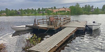 Reisemobilstellplatz - Spielplatz - Schweden - unser Floß mit Sonnensegel - Trollforsen Camping & Cottages Services AB