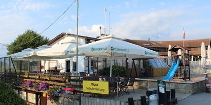 Reisemobilstellplatz - Grauwasserentsorgung - Lindau (Bodensee) - Kioskterrasse mit Spielplatz - Rohrspitz Yachting Salzmann e.U.