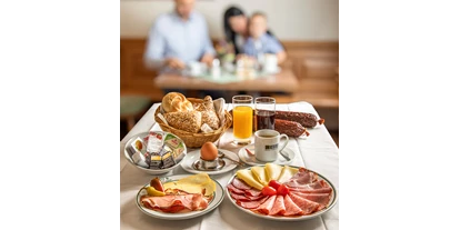 Reisemobilstellplatz - WLAN: nur um die Rezeption vorhanden - Holzleiten (Naarn im Machlande) - im Frühstücksraum
Frühstück gibt es nach Voranmeldung - Weinbauer - Pension-Linz