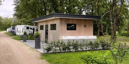 Reisemobilstellplatz - Art des Stellplatz: bei Gewässer - Drunen - Beheiztes Sanitärgebäude kostenlos für Camper-Gäste. - Camperplaats Biest-Houtakker