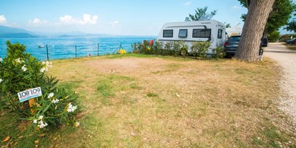 Motorhome parking space - Duschen - Italy - Sivinos Camping Boutique