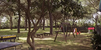 Place de parking pour camping-car - WLAN: nur um die Rezeption vorhanden - Italie - Spielplatz - La Pampa Parking Area & Camp