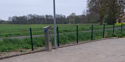 Motorhome parking space - Spielplatz - Osnabrücker Land - die neuen Stellplätze mit Stromsäule - Wohnmobilstellplätze am Freibad