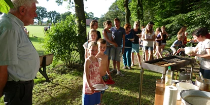 Posto auto camper - Wohnwagen erlaubt - Barnstorf - Kochen auf der Sonnenwiese - Campingplatz am Ehrlingshof