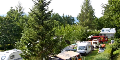 Reisemobilstellplatz - Duschen - Großweil - Parzellierte Stellplätze in Seenähe - Stellplatz Campingplatz Brugger am Riegsee