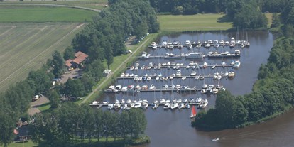 Motorhome parking space - SUP Möglichkeit - Lauwersoog - Haven Hunzegat