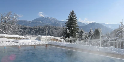 Place de parking pour camping-car - Badestrand - L'Autriche - Baden im Winter in Schneebedeckter Umgebung bei 32° warmen Wasser - Seencamping Stadlerhof