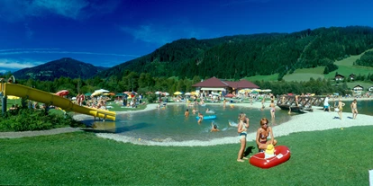 Reisemobilstellplatz - Grauwasserentsorgung - See (Hüttschlag) - Wasserrutsche, mit Kinderbecken - Stellplatz See-Camping Eben