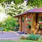 Parkeerplaats voor campers - Wiesenhütte mit Biergarten - Freizeit- und Campingpark Thräna