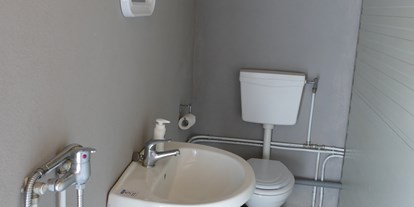 Motorhome parking space - Frischwasserversorgung - Italy - Toilette / Bad - Agricamping - Agriturismo Petra di Cossu