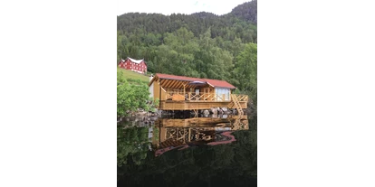 Motorhome parking space - Norway - Heglandsodden hytter og camping