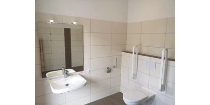 Reisemobilstellplatz - SUP Möglichkeit - Oberscheidweiler - Unsere 3 WC/Duschräume sind alle barrierefrei - Wohnmobilpark Vulkaneifel