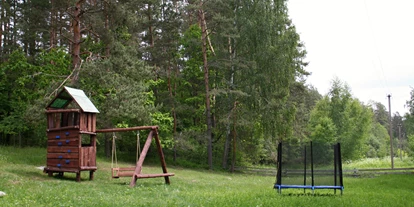 Parkeerplaats voor camper - Badestrand - Letland - Spielplatz - Upes Dizvietas
