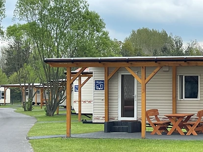 Reisemobilstellplatz - Art des Stellplatz: im Campingplatz - Altdöbern - Mobilheime zum mieten - Camp Casel - Das Feriendorf für Camping und Wohnen am Gräbendorfer See