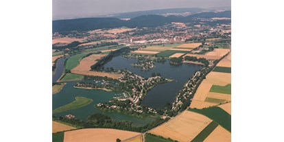 Reisemobilstellplatz - Wintercamping - Weserbergland - Unser See aus der Luft - Erholungsgebiet Doktorsee