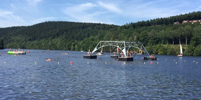 Reisemobilstellplatz - Angelmöglichkeit - Pelm - Wasserseilgarten am Kronenburger See - Wohnmobilstellplatz Kronenburger See