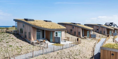 Reisemobilstellplatz - Umgebungsschwerpunkt: Meer - Thyborøn - Neue Hütten auf dem Campingplatz - Vorupør Camping