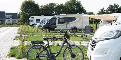 Motorhome parking space - Badestrand - KAMPERLAND - Camperpark 't Veerse Meer