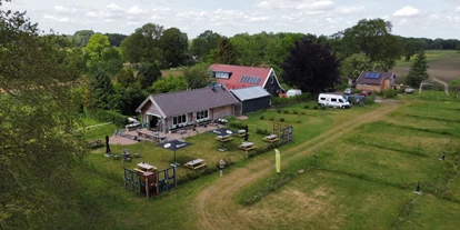 Place de parking pour camping-car - PP IJhorst - Restaurant Terrasse Empfang - Camping Het Hazenpad