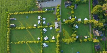 Parkeerplaats voor camper - Wezuperbrug - Kleine maar ook grote velden - Camping de Bosrand Spier