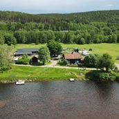 Parkeerplaats voor campers - Nice campsite at the river Klarälven and the foot of the mountains - Sun Dance Ranch