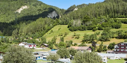 Reisemobilstellplatz - Umgebungsschwerpunkt: Berg - Oberinntal - Camping Dreiländereck Tirol, Blockhütten & Apartments