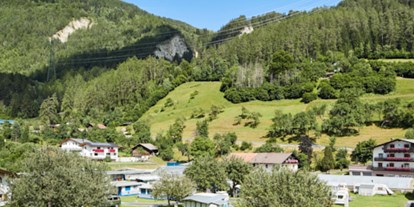 Reisemobilstellplatz - Umgebungsschwerpunkt: Berg - Nauders - Camping Dreiländereck Tirol, Blockhütten & Apartments