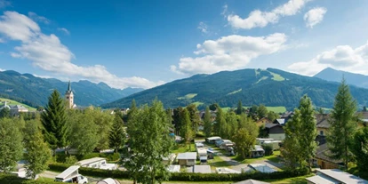 Reisemobilstellplatz - Wohnwagen erlaubt - See (Hüttschlag) - Ob im Sommer oder im Winter – genießen Sie auf unserem Campingplatz in Radstadt, Salzburg, die wunderbare Natur und das herrliche Bergpanorama - Tauerncamping Radstadt