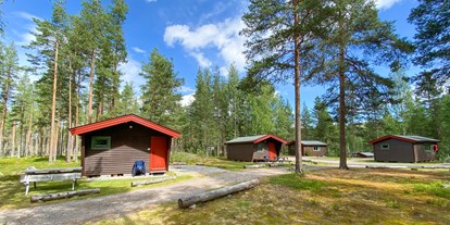 Motorhome parking space - Spielplatz - Norway - Hütten C - Koppang Camping og Hytteutleie