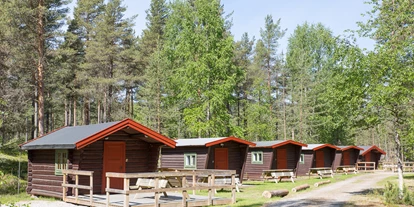 Parkeerplaats voor camper - Bademöglichkeit für Hunde - Noorwegen - Hütten B + C - Koppang Camping og Hytteutleie