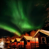 RV parking space - Northen lights in winter. - Base Camp Hamarøy