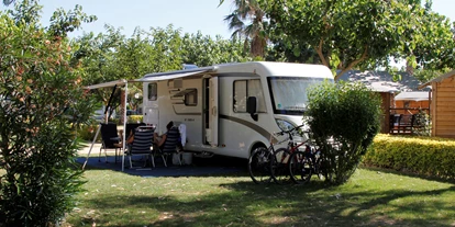 Parkeerplaats voor camper - WLAN: am ganzen Platz vorhanden - Catalonië - Camping Las Palmeras - Costa Brava