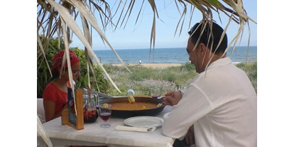 Parkeerplaats voor camper - Umgebungsschwerpunkt: Strand - Spanje - Paella in unserem Restaurant am Meer - Camping San Vicente