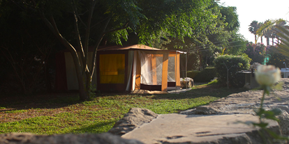 Reisemobilstellplatz - Bademöglichkeit für Hunde - Italien - Area tende - Camping Flintstones Park