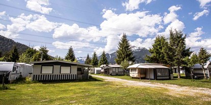 Reisemobilstellplatz - WLAN: am ganzen Platz vorhanden - Tirol - Großzügige Naturstellplätze am Camping Biberhof - Stellplatz am Camping Biberhof