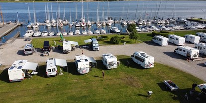 Motorhome parking space - Denmark - Mobile home area direct at the water front - Hadsund Sejlklub