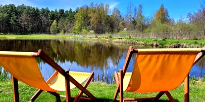 Parkeerplaats voor camper - Art des Stellplatz: ausgewiesener Parkplatz - Gierłoż - Kemping nad stawem Harsz/ Camping am Teich Harsz