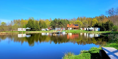 Reisemobilstellplatz - Art des Stellplatz: im Campingplatz - Gierłoż - Kemping nad stawem Harsz/ Camping am Teich Harsz