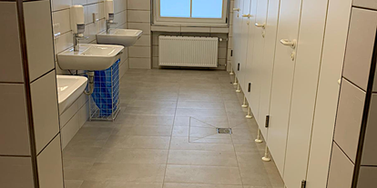 Reisemobilstellplatz - Bademöglichkeit für Hunde - Brand (Telfs) - Sanitäranlagen - Wohnmobilhafen Zugspitze