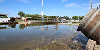 Reisemobilstellplatz - Duschen - Frisches Havelwasser im Naturteich - Stadtmarina Brandenburg