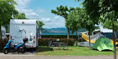 Motorhome parking space - Grauwasserentsorgung - Trentino-South Tyrol - WOHNMOBILSTELLPLATZ CALDONAZZO