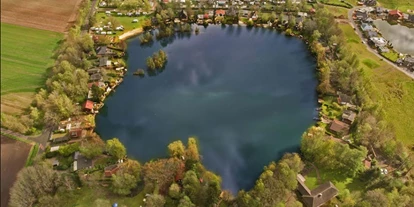 Reisemobilstellplatz - Umgebungsschwerpunkt: am Land - Lünne - Luftbild über den gesamten Blauen See. - Campingplatz Blauer See / Reisemobilstellplatz am Blauen See