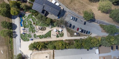 Motorhome parking space - Duschen - Kupferzell - Lageplan - eine Luftaufnahme von oben - Jagstblick Camping