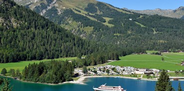 Reisemobilstellplatz - Wohnwagen erlaubt - Schwaz - Stellplatz vor und im Alpen Caravan Park Achensee