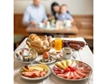 Wohnmobilstellplatz: im Frühstücksraum
Frühstück gibt es nach Voranmeldung - Weinbauer - Pension-Linz
