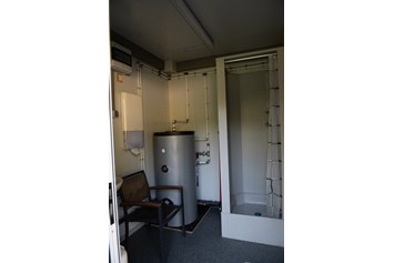 Wohnmobilstellplatz: Dusch-Container  - IKUNA Camping