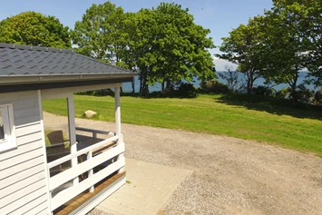 Wohnmobilstellplatz: Mini Lodge mit Meerblick für 2 Persoen - Stellplatz am Camping Klausdorfer Strand